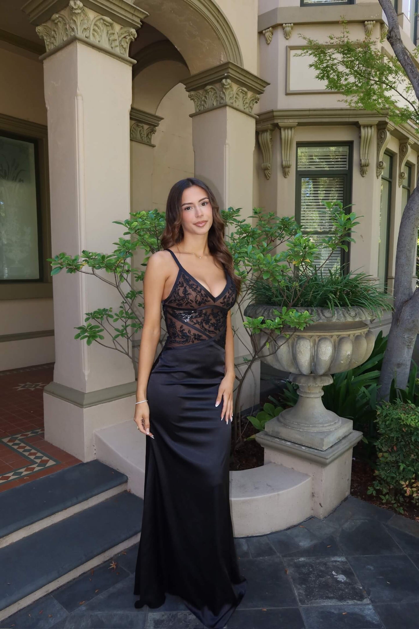 Vintage Beaded Formal Dress showcasing detailed beading and a timeless formal silhouette from the back