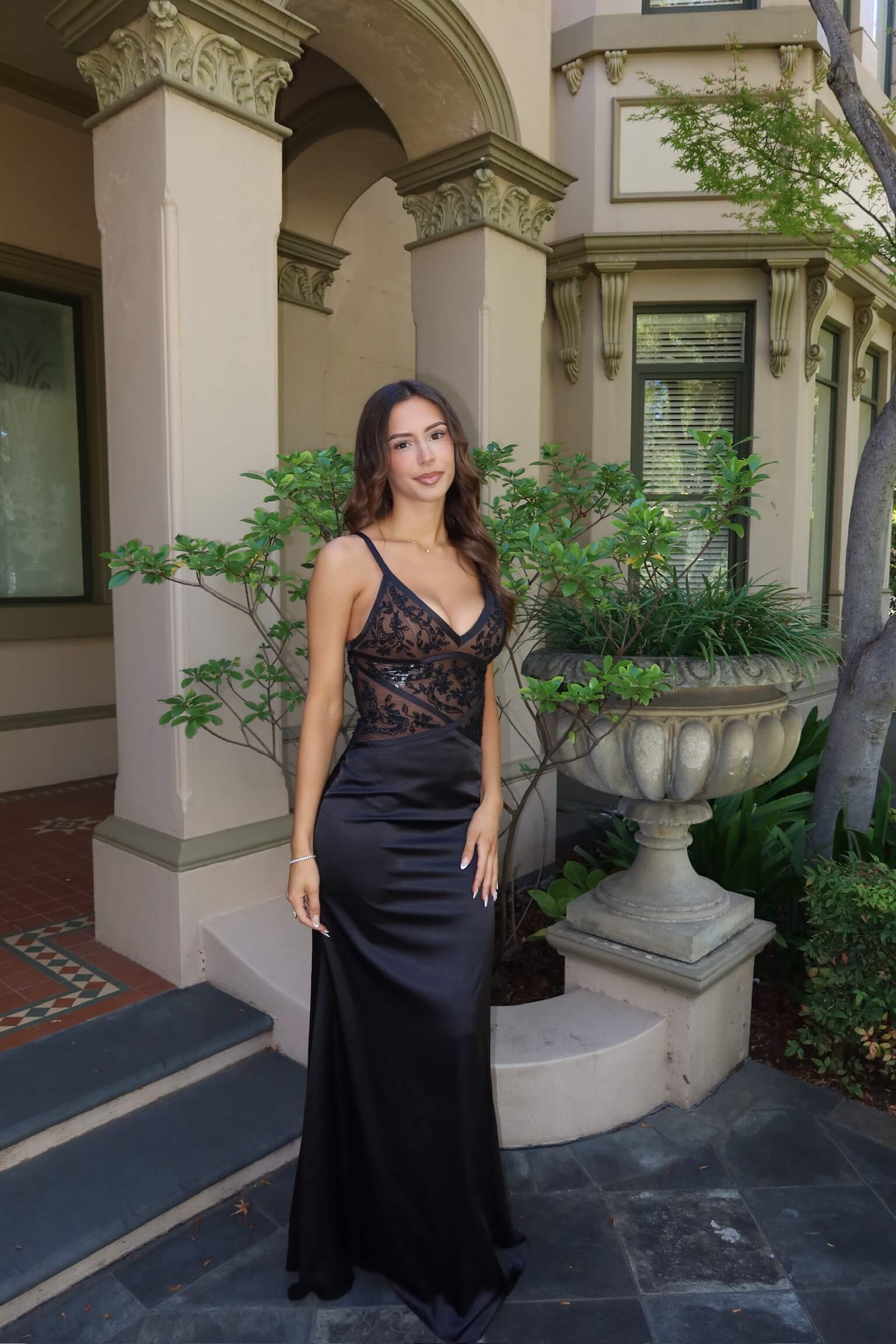 Vintage Beaded Formal Dress showcasing detailed beading and a timeless formal silhouette from the back