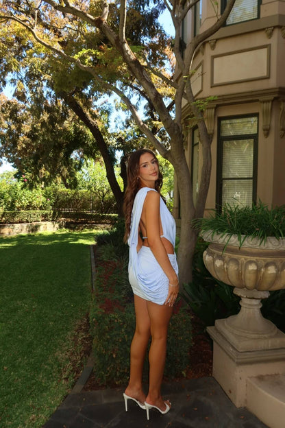 Vivienne Collection Lilou Mini Dress in blue showcasing the elegant back design and flattering mini silhouette